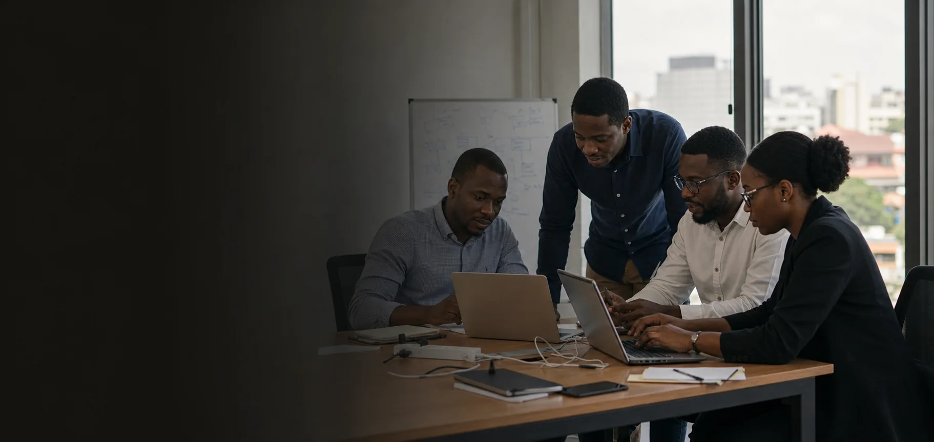 Technology consultants collaborating in a West African office